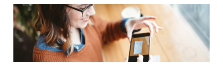 a woman using remote deposit