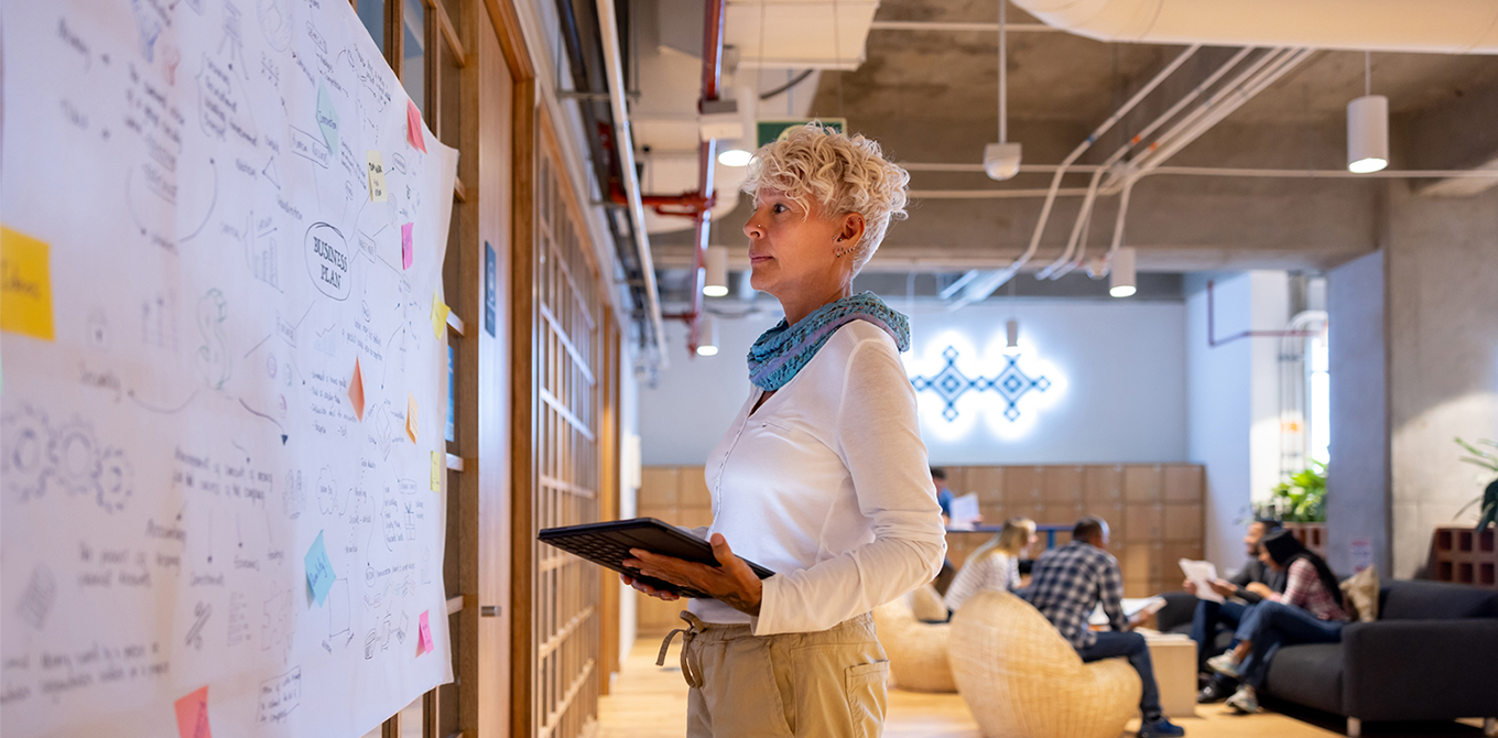 a woman making a business plan